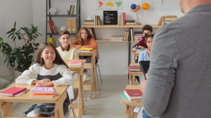 Children sat in a classroom envrionment